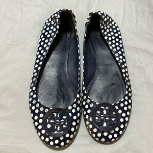 Navy and white polka dot ballerina flats.